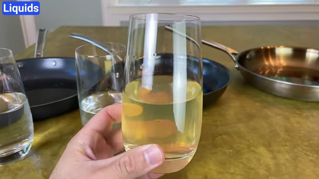 Close-up of the cloudy, yellow-tinted water from the Strata pan, indicating seasoning breakdown.