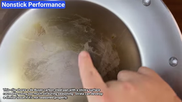 A De Buyer carbon steel pan with a tacky surface due to improper seasoning.