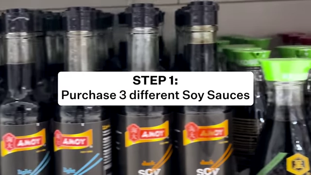 A shelf displaying various bottles of soy sauce at a grocery store.