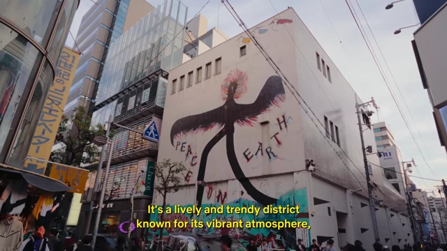 A colorful mural on the side of a building in Amerika-mura, reflecting the district's vibrant and artistic atmosphere.