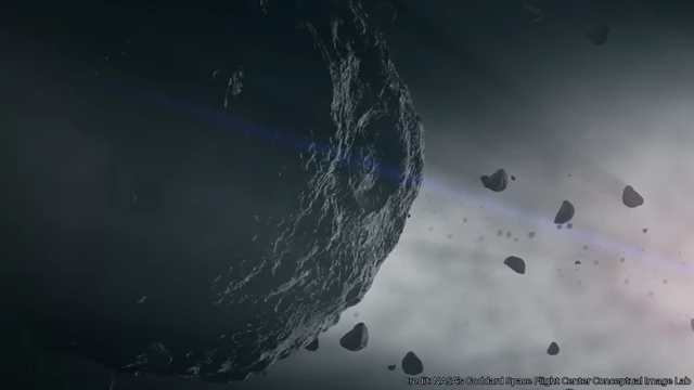 Artist's impression of a large asteroid shattering into many smaller pieces and debris after a high-speed collision.