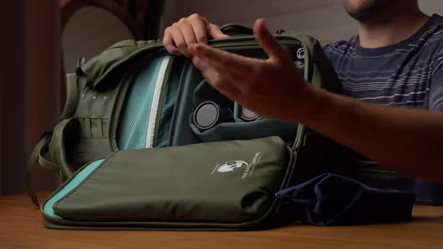 Inside a robust travel photography backpack showing organized gear