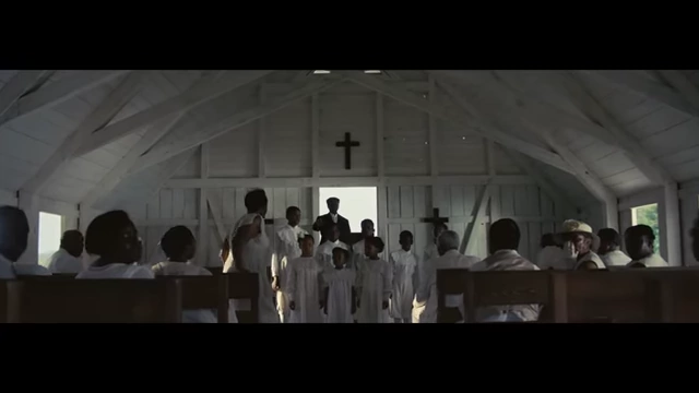 The interior of the church scene, showcasing the production design and contrast in textures.