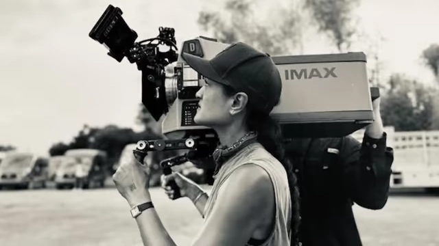 Cinematographer Autumn Durald Arkapaw operating a handheld IMAX camera, marking a historic achievement.