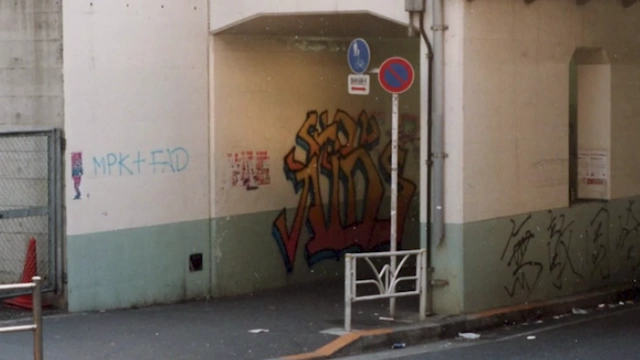 A tweet from Barry McKinnon with a photo of graffiti in an underpass near Shibuya Station from his 1993 visit.