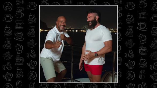Bill Perkins and Dan Bilzerian pose together on a boat at night.