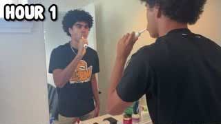The presenter brushing his teeth in front of a mirror with the text "HOUR 1" overlaid.