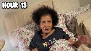 The presenter's grandmother lying in bed, looking surprised, with the text "HOUR 13" overlaid.