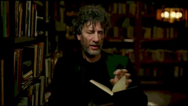Neil Gaiman showing the notebook he used to write "A Calendar of Tales"