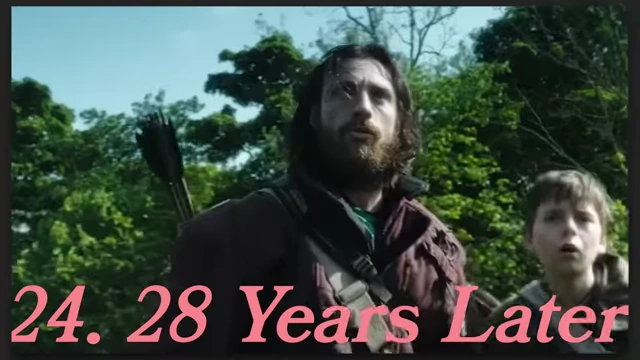 A man with a bow and arrow standing with a child in "28 Years Later."