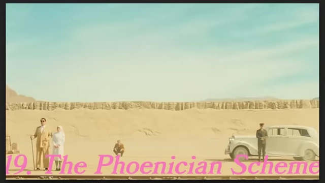 Characters stand in a desert landscape with a car, characteristic of Wes Anderson's style, in "The Phoenician Scheme."