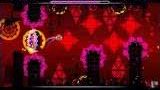 Geometry Dash gameplay with red diamond patterns and purple obstacles
