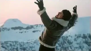 Rocky Balboa training outdoors in the snow, contrasting with the gym-based training style.