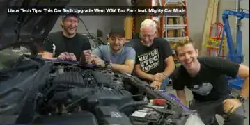 Alex and the Mighty Car Mods team in the workshop