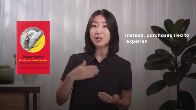 The book "Happy Money" by Elizabeth Dunn and Michael Norton is shown, emphasizing that purchases tied to experiences, connection, or shared meaning create long-lasting joy, unlike spending on status symbols.