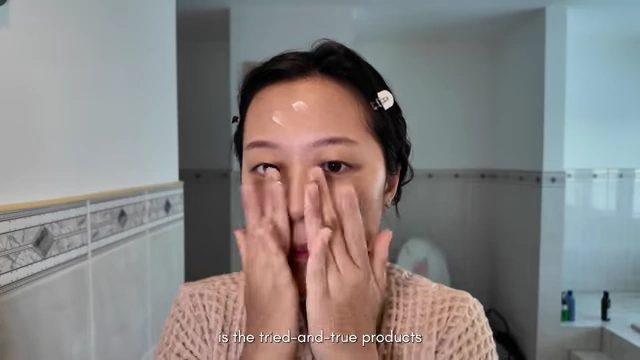 Applying a tried-and-true skincare product as part of a consistent routine.