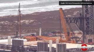 Tank farm with a crane removing propellant tanks