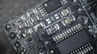 A close-up of the SIDKick Pico board showing a solder jumper being bridged to enable internal audio output.
