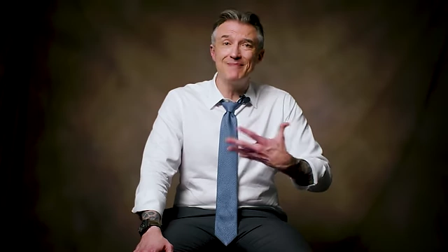 James Sexton discussing marriage and relationships with an open hand gesture.