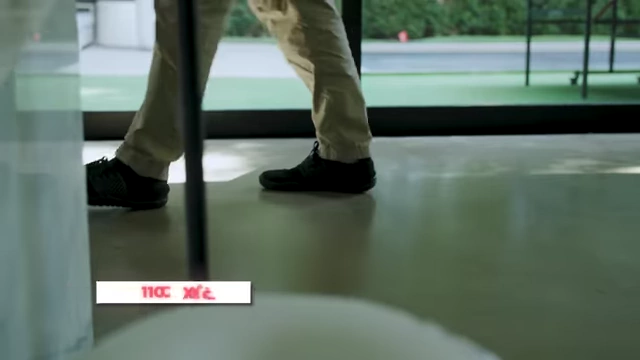 Feet are shown on a hard floor, introducing the topic of floor toxicity.