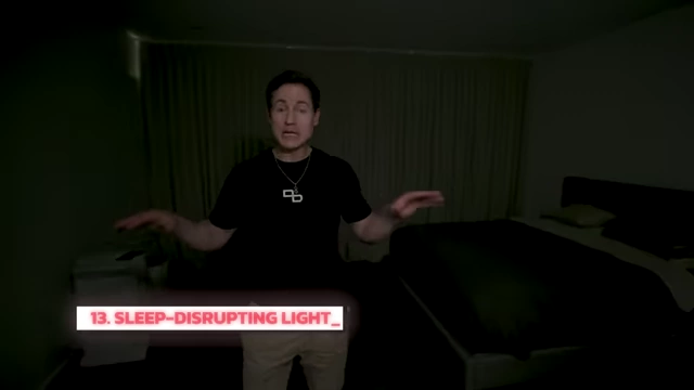 Bryan Johnson in his blacked-out bedroom, addressing sleep-disrupting light.