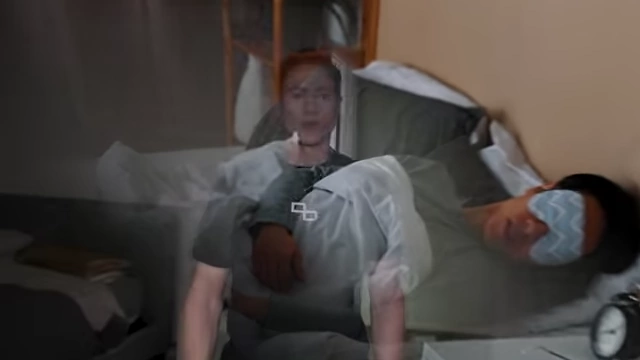 A person sleeping with an eye mask, offering an alternative to a completely blacked-out room.
