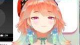 Kiara with a suggestive expression after talking about sitting on Pekora