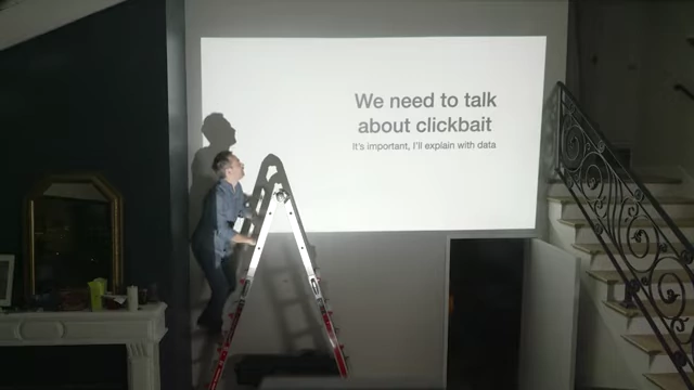 A slide titled "We need to talk about clickbait" used in a Veritasium video to discuss media literacy.