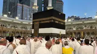 Pilgrims performing the Hajj pilgrimage around the Kaaba in Mecca, an example of how real-world rituals are tied to religious stories.