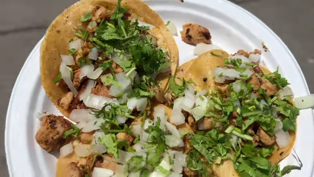 A plate of street tacos, an alternative food option outside the convention.