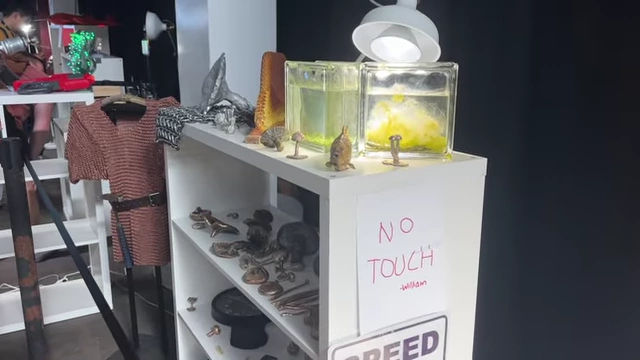 A "NO TOUCH" sign displayed in the creator museum.