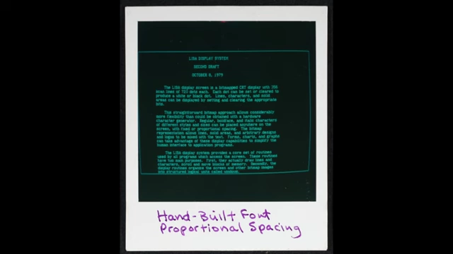Polaroid showing a hand-built font with proportional spacing on Lisa