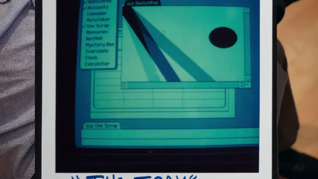 Polaroid showing "The Tray" concept for desktop organization on Lisa