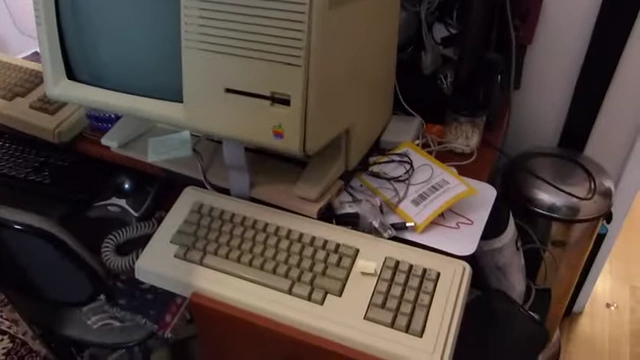 A Lisa D sound board being installed into an Apple Lisa
