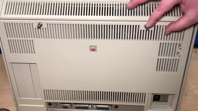 Demonstrating how to open the back of the Lisa with a thumb latch
