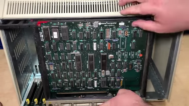 Sliding out the internal card tray of the Lisa for service