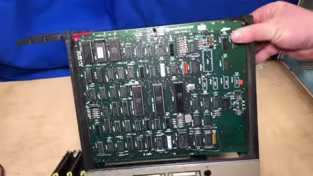 Easily removing a board from the Lisa's internal tray