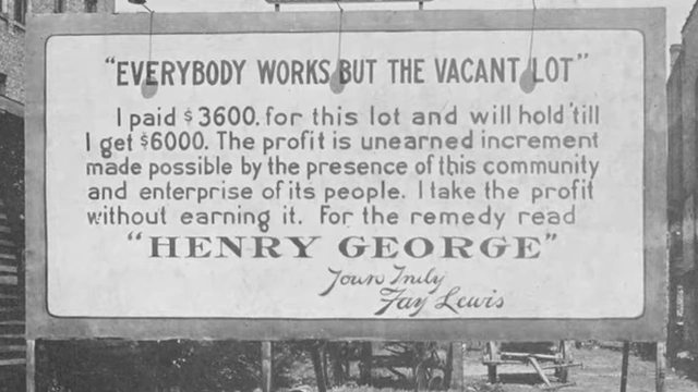 Billboard quoting Henry George about unearned increment from vacant land