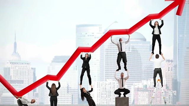 People supporting an upward-trending graph, symbolizing economic growth