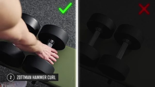 Proper dumbbell grip in the middle of the handle, avoiding the thumb resting against the head