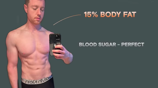 The speaker at 15% body fat, with text overlays indicating perfect blood sugar, high testosterone, normal blood pressure, and almost zero dangerous visceral fat.