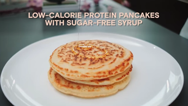 Low-calorie protein pancakes with sugar-free syrup, representing the speaker's food obsession.