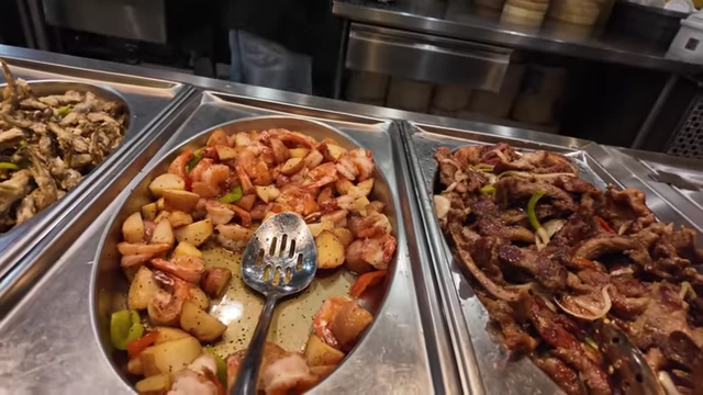 Hot food options including potatoes and shrimp.