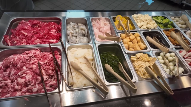 A close-up of the fresh protein and vegetable selections for the Malatang.