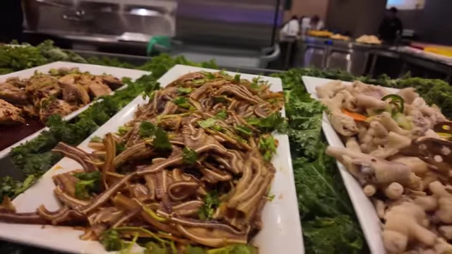 Cold appetizers including pig's ear and chicken feet.