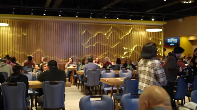 A wide view of the busy dining area during a Monday lunch.