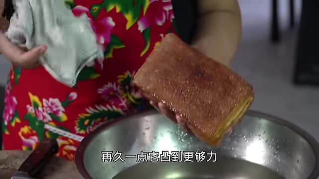Fried pork belly after soaking, showing the expanded and bubbly skin.