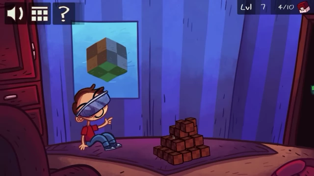 A child in a virtual reality headset is building blocks with a floating cube image on the wall