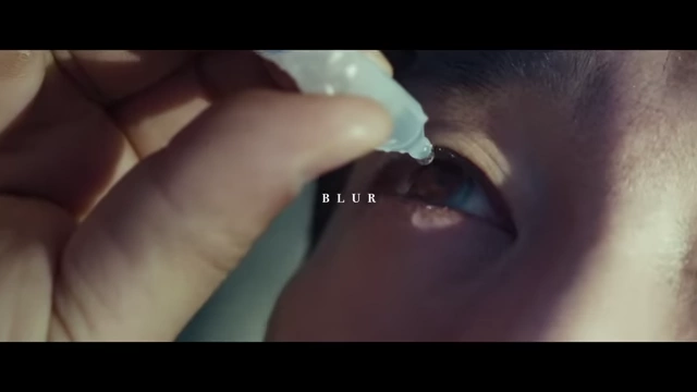 A close-up of an eyedrop blurring the vision, representing the theme of obscurity and Hae-jun's search for clarity.
