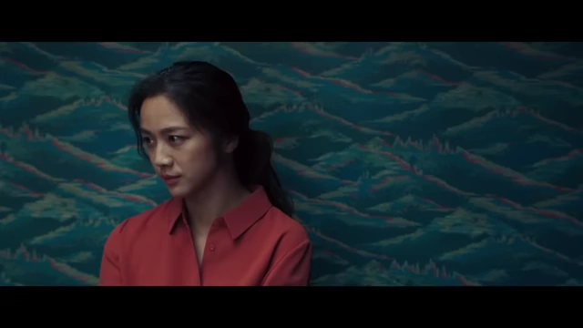 Seo-rae against a wave-patterned turquoise wallpaper, visually representing the mountain/ocean dichotomy and the blend of their worlds.